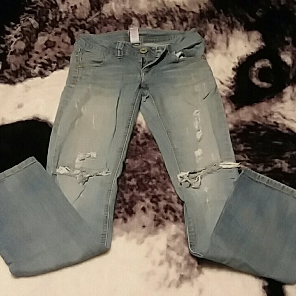 Distressed jeans. Very comfortable looking. Size 1